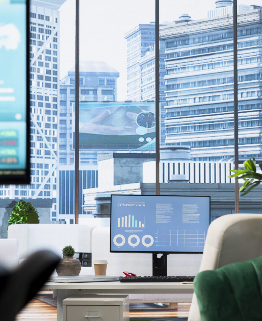 Business performance statistics on a screen in a boardroom