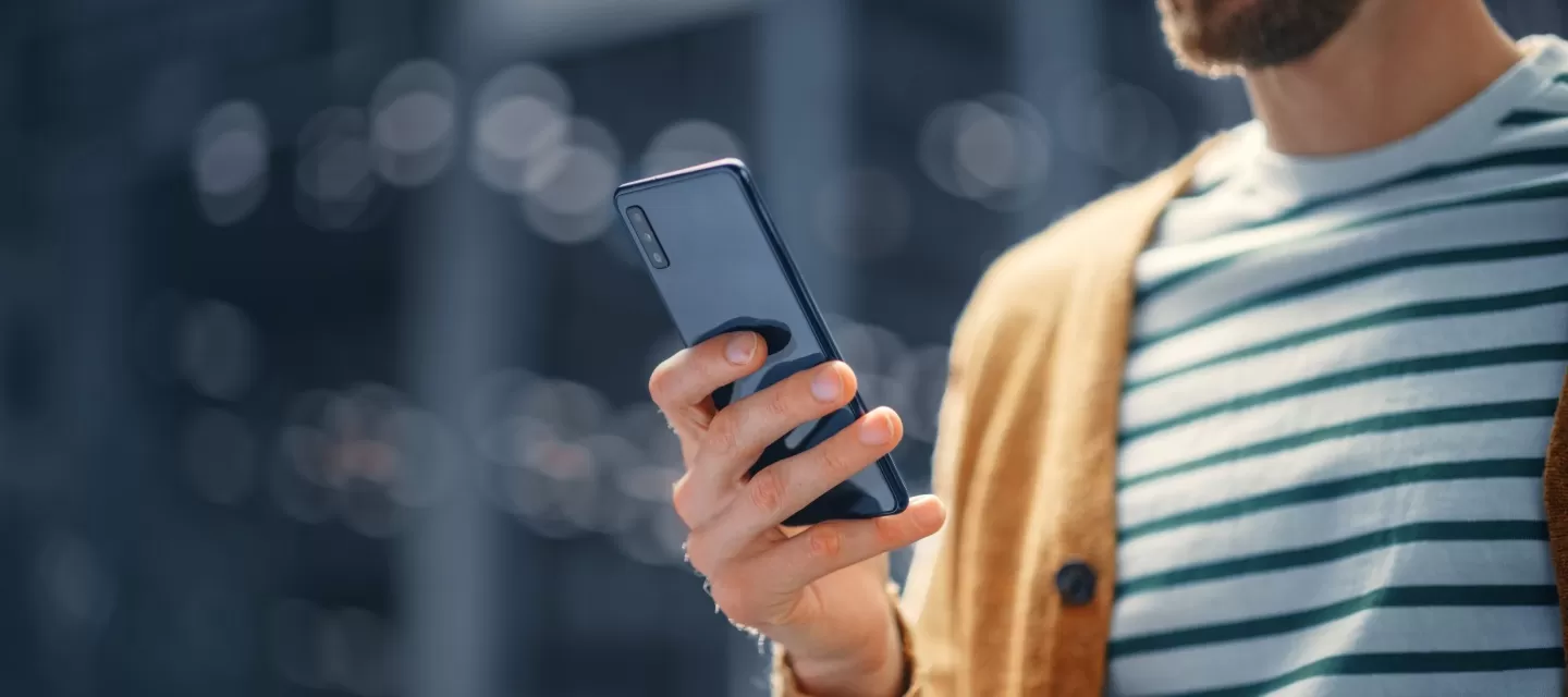 Person contacting the ProSuccess team from a mobile phone